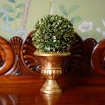 Topiary Ball Dusted Gold In Gold Urn By Gisela Graham