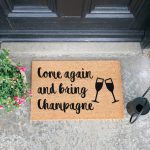 Bring Champagne Door Mat